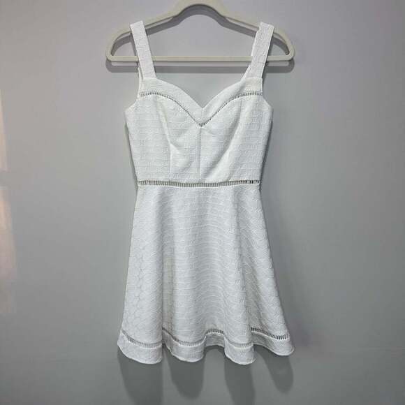 B. Darlin Dresses & Skirts - B. Darlin White Textured Fit & Flare Mini Dress with Crochet Ladder Trim Detail,
